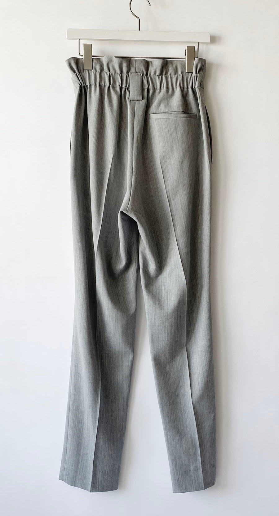 Pants with tucks