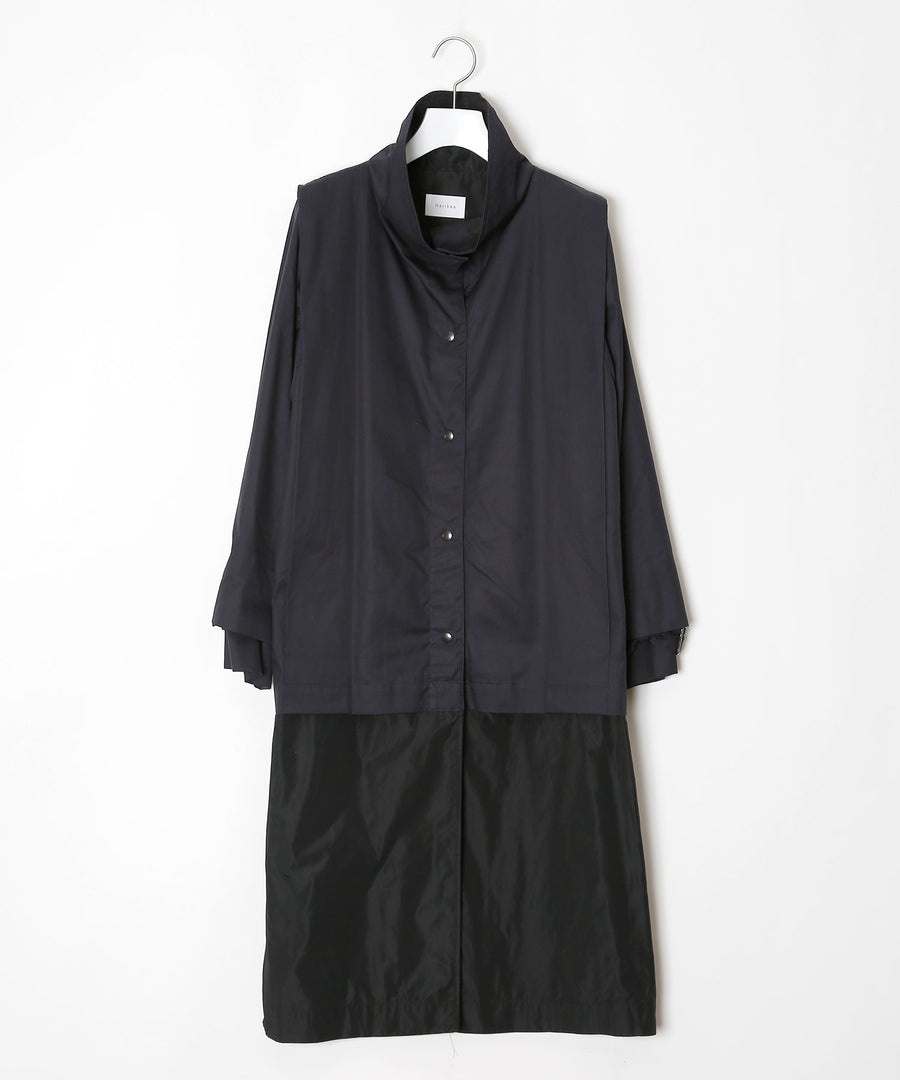 Coat with tucks