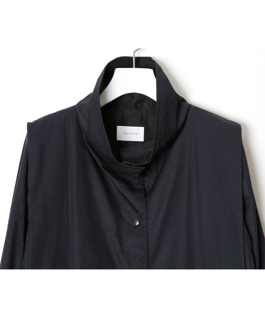 Coat with tucks